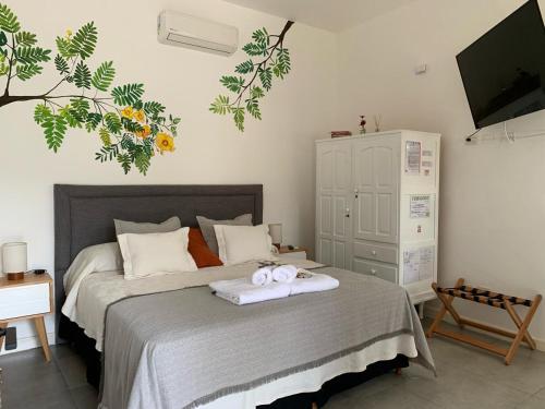 Ένα ή περισσότερα κρεβάτια σε δωμάτιο στο Las Tipas mini loft Cafayate