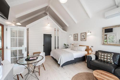 Katil atau katil-katil dalam bilik di Beach Huts Middleton