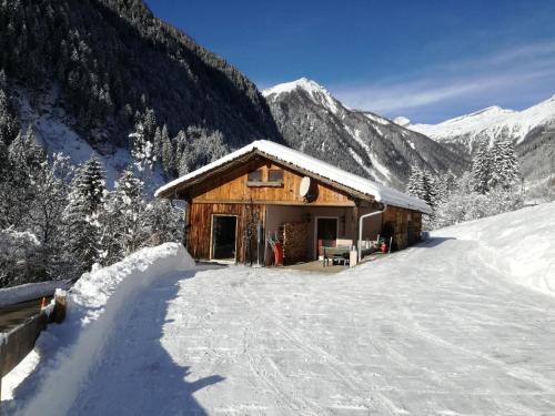 Nettes Ferienhaus in Innerfragant mit Garten, Terrasse und Grill tokom zime