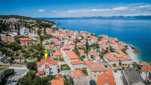 an aerial view of a town next to the water at Apartments by the sea Sutivan, Brac - 22721 in Sutivan