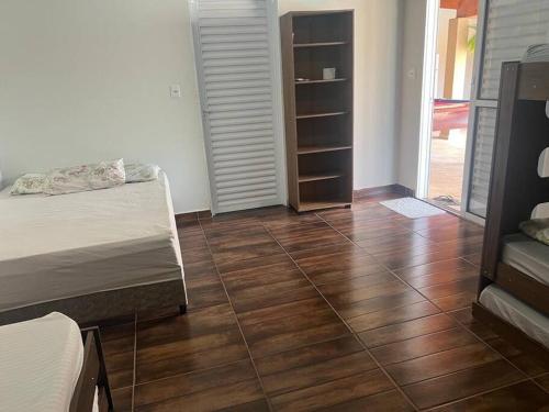 Postel nebo postele na pokoji v ubytování Recanto Olavinho