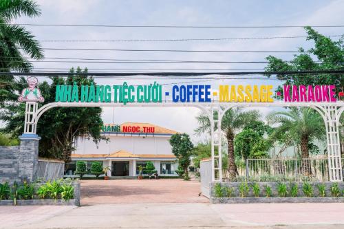 a building with a sign that reads miami detention coil coffee machine at NGOC THU HOTEL in Soc Trang