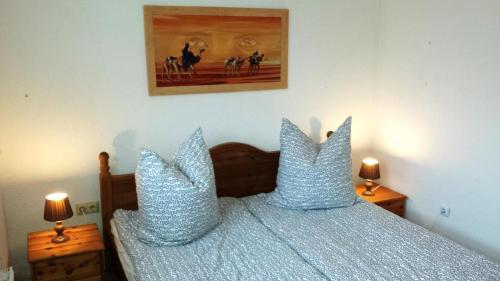 Postel nebo postele na pokoji v ubytování Ferienwohnung für 4 Personen ca 70 m in Hinte, Nordseeküste Deutschland Ostfriesland