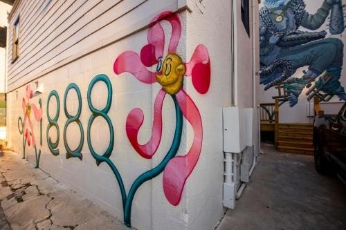 a painting of a flower on the side of a building at The 1888 Hotel in St Petersburg