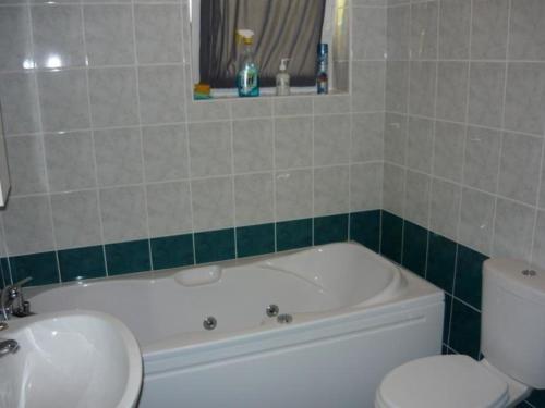 Koupelna v ubytování Wohnung in Barbat mit Terrasse und Grill