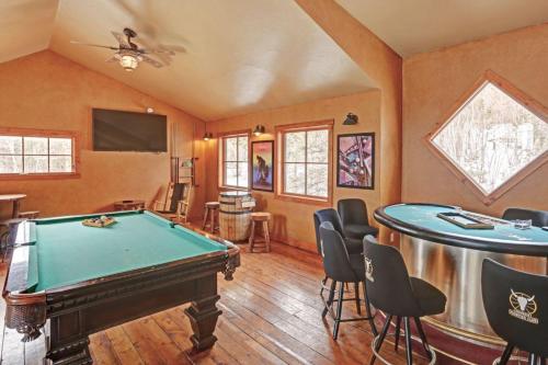 a room with a pool table and a barrel at Gold Rush Lodge in Lead