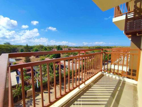 a balcony of a condo with a view at Palawan Paradise Condotel 6F in Puerto Princesa City