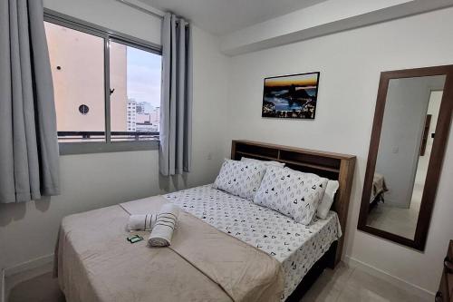 Postel nebo postele na pokoji v ubytování Seu lindo lar no centro Carioca