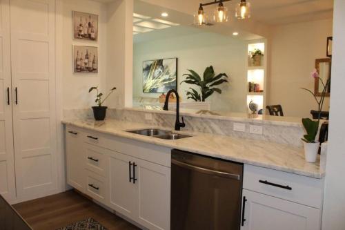 a kitchen with a sink and a counter top at Lake Marlin Villa in Port Charlotte