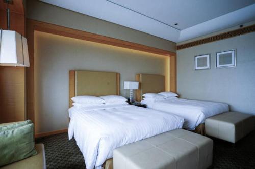 Кровать или кровати в номере Mine Hotel