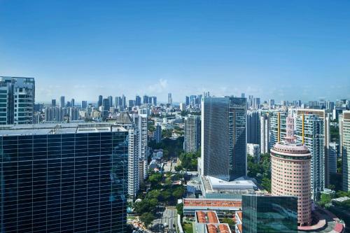 an aerial view of a city with tall buildings at Courtyard by Marriott Singapore Novena in Singapore