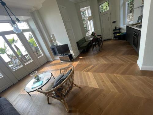 a living room with a chair and a table at Apartment in Vignone Villa Setting in Vignone