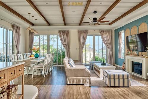 a living room with a couch and a fireplace at Seastar Villa in Bình Tú