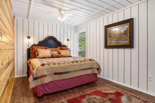 a bedroom with a bed in a room at Big Fern Cabin in Vanderpool