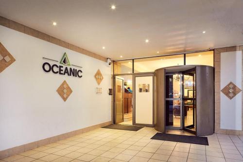 an entrance to a store with an open door at The Oceanic 1 bedroom with Ocean views - Self-catering Apartment in Durban