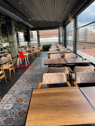 a row of tables and chairs in a restaurant at Burj Al Istanbul in Istanbul