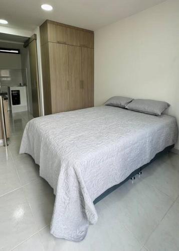 Postel nebo postele na pokoji v ubytování Loft con aire acondicionado