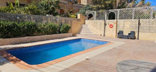 Gallery image of Poolside, 2 bedroom flatlet in Is-Swieqi