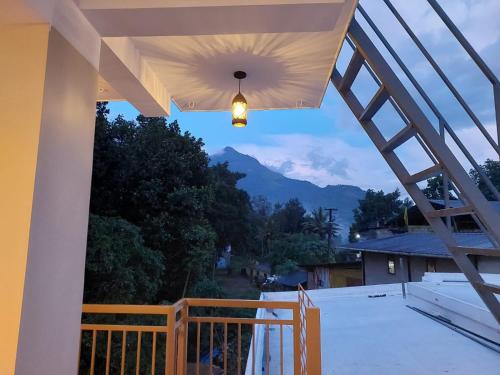 a view from the balcony of a house at Karthika Homes in Anachal