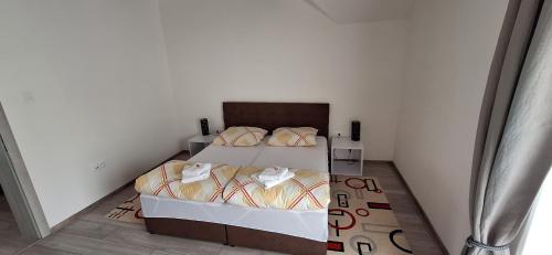 Ein Bett oder Betten in einem Zimmer der Unterkunft Apartmány Orava