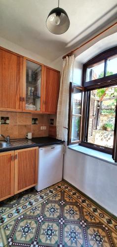 Una cocina o cocineta en Guesthouse Parthenon