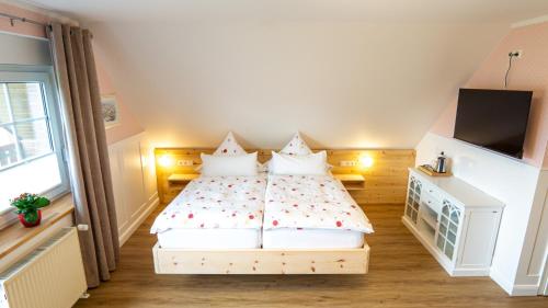 Katil atau katil-katil dalam bilik di Sonnenhof Damnatz -Hotel garni-