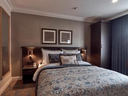 Кровать или кровати в номере Good Seasons Hotel Den Bosch