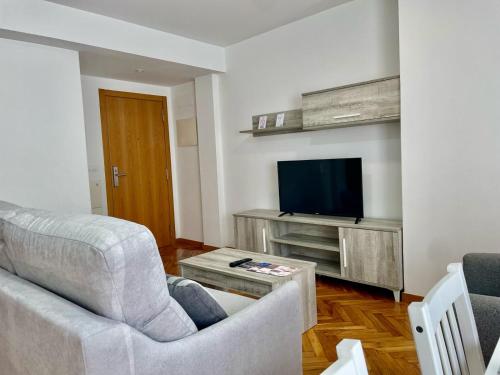 Televisyen dan/atau pusat hiburan di Cíes Premium Suitel García Barbón 73 - Love your Stay