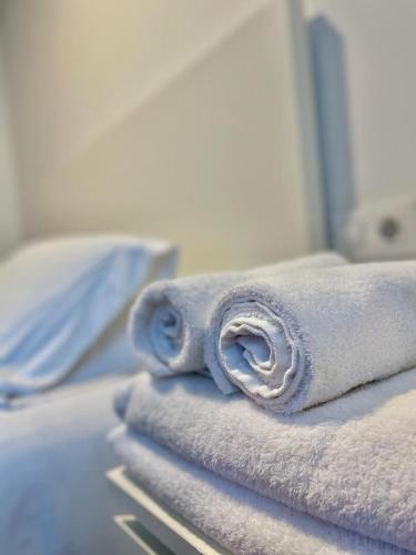 Katil atau katil-katil dalam bilik di Cíes Premium Suitel García Barbón 73 - Love your Stay