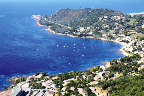 an aerial view of a bay with boats in the water at Residence Les Dauphins in Tiuccia with balcony in Casaglione