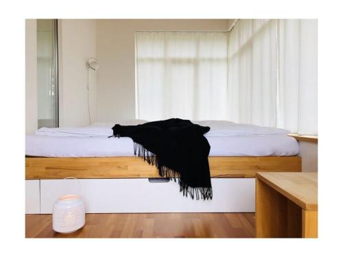 Postel nebo postele na pokoji v ubytování Holiday apartment Haus Sundevit