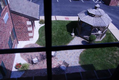 an aerial view of a backyard with a gazebo at Country Hearth Inn & Suites Edwardsville in Edwardsville