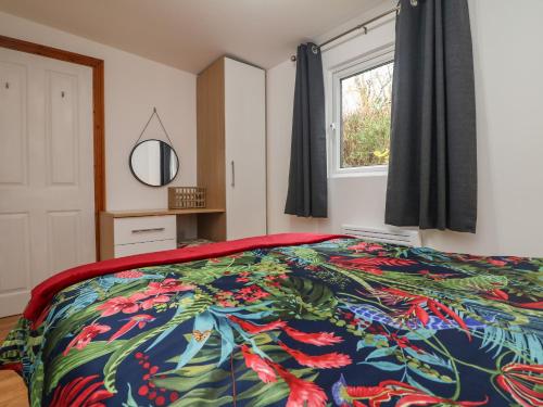 Postel nebo postele na pokoji v ubytování Palm Lodge