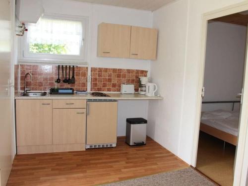 Η κουζίνα ή μικρή κουζίνα στο Bungalow Oberspreewald 2
