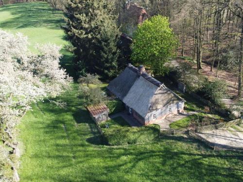 an aerial view of a house in the middle of a field at Holiday home Hirtenkate apartment 2 in Gödenstorf