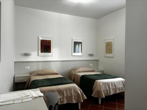 Postel nebo postele na pokoji v ubytování La Nuova Dimora B&B
