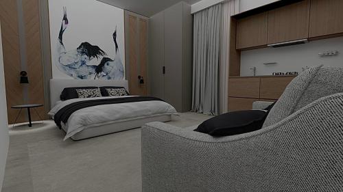 a bedroom with a bed and a couch at SKIATHOS MODERNO in Skiathos