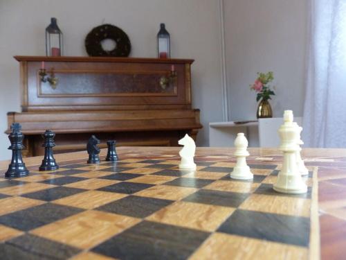 a chess board with chess pieces on top of it at WERTS HOF Holiday home in Bracht