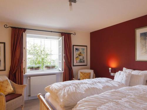 Postel nebo postele na pokoji v ubytování Holiday Apartment Garden Suite