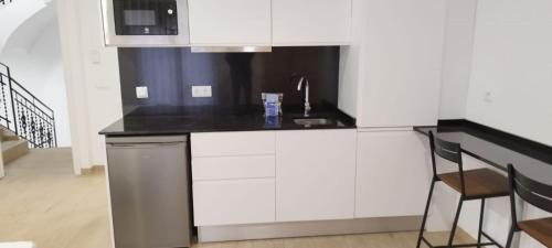 Kuchyňa alebo kuchynka v ubytovaní SM Apartments