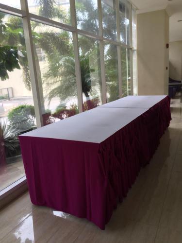 a purple table in a room with a large window at El Cielito Inn - Sta. Rosa in Santa Rosa