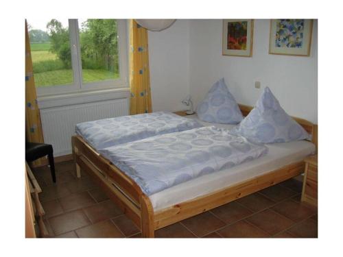 Ein Bett oder Betten in einem Zimmer der Unterkunft Holiday home Santelmann House II