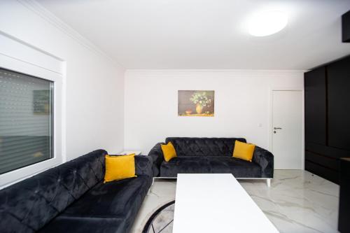 Zona de estar de Apartmani Andric Budva