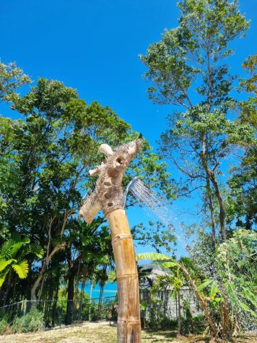 a stuffed animal on top of a wooden pole at Ocean view Rocky Hill in Content