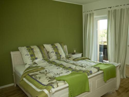 Postel nebo postele na pokoji v ubytování Holiday apartment Diana