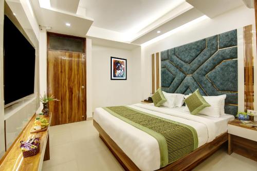 Postel nebo postele na pokoji v ubytování Hotel Star Villa - Front of New Delhi Railway Station & 5 Minute from Connaught Place