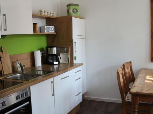 Cuisine ou kitchenette dans l'établissement Holiday home MaRa