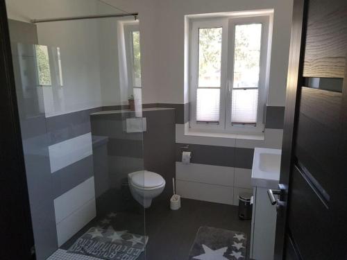 ห้องน้ำของ Golf idyll holiday apartment