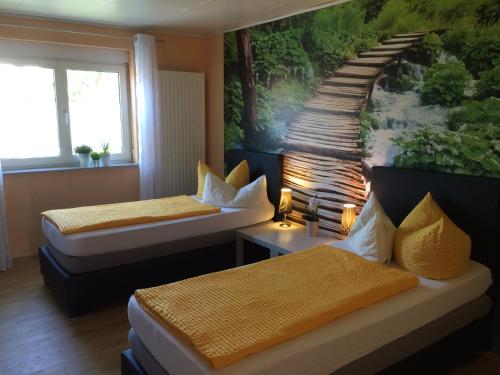 Voodi või voodid majutusasutuse Hotel Gute Nacht toas