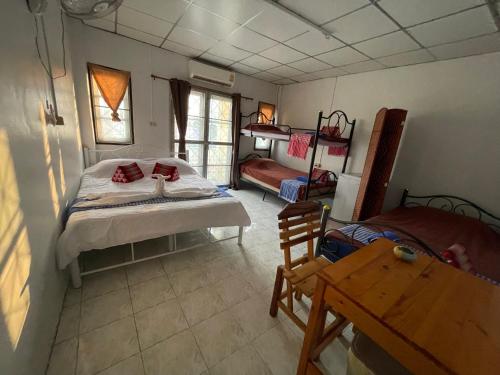 Postel nebo postele na pokoji v ubytování Noot's Guesthouse